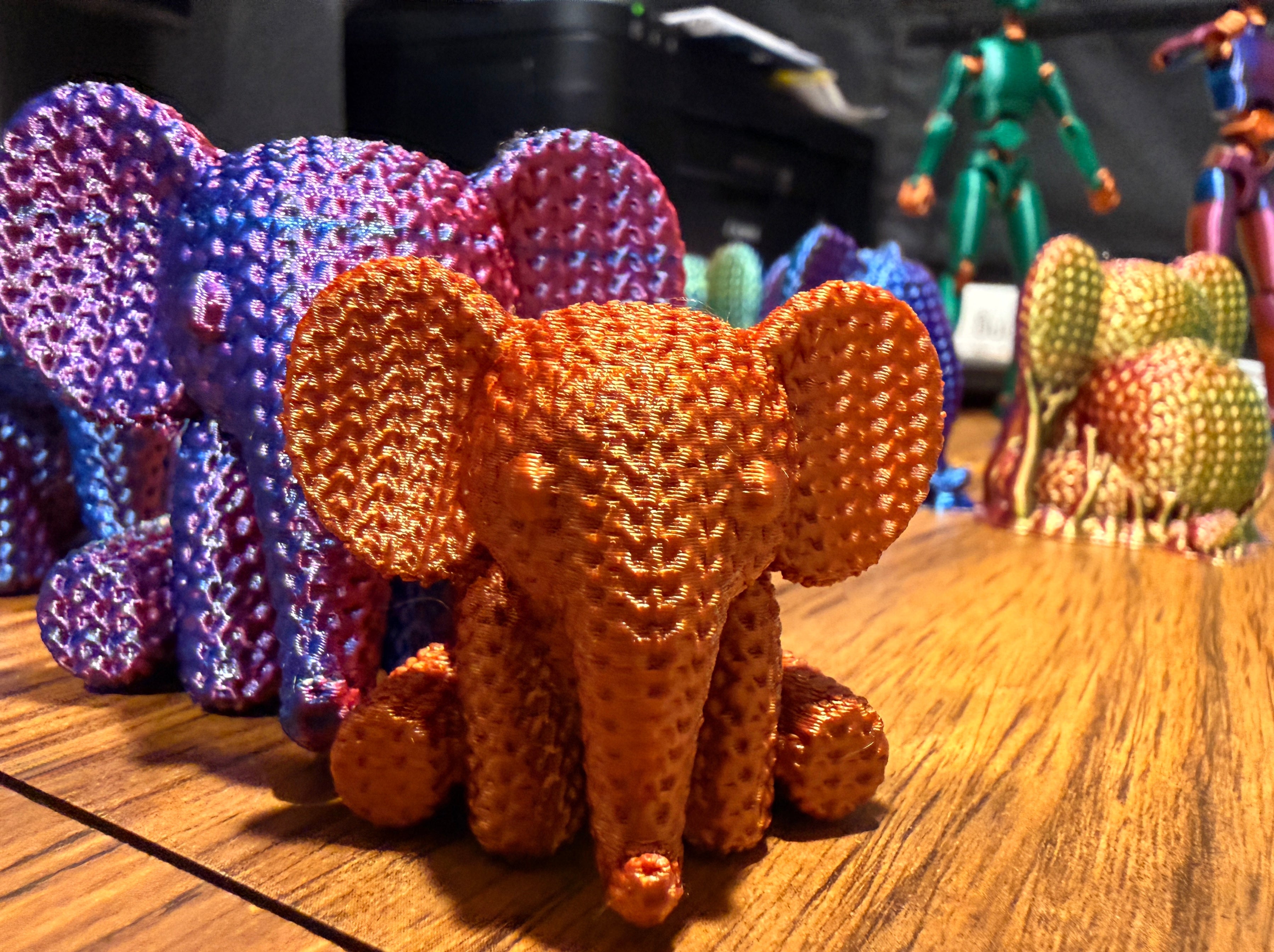 The Copper Elephant with purple multicolor neighbor