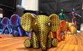 The Gold/Black Elephant 75% size, gold-with-dark-streaks silk PLA