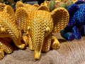 The Gold Elephant 100% size hero shot, gold silk PLA knurled texture